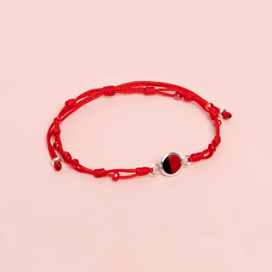 PULSERA HUAYRURO HILO ROJO