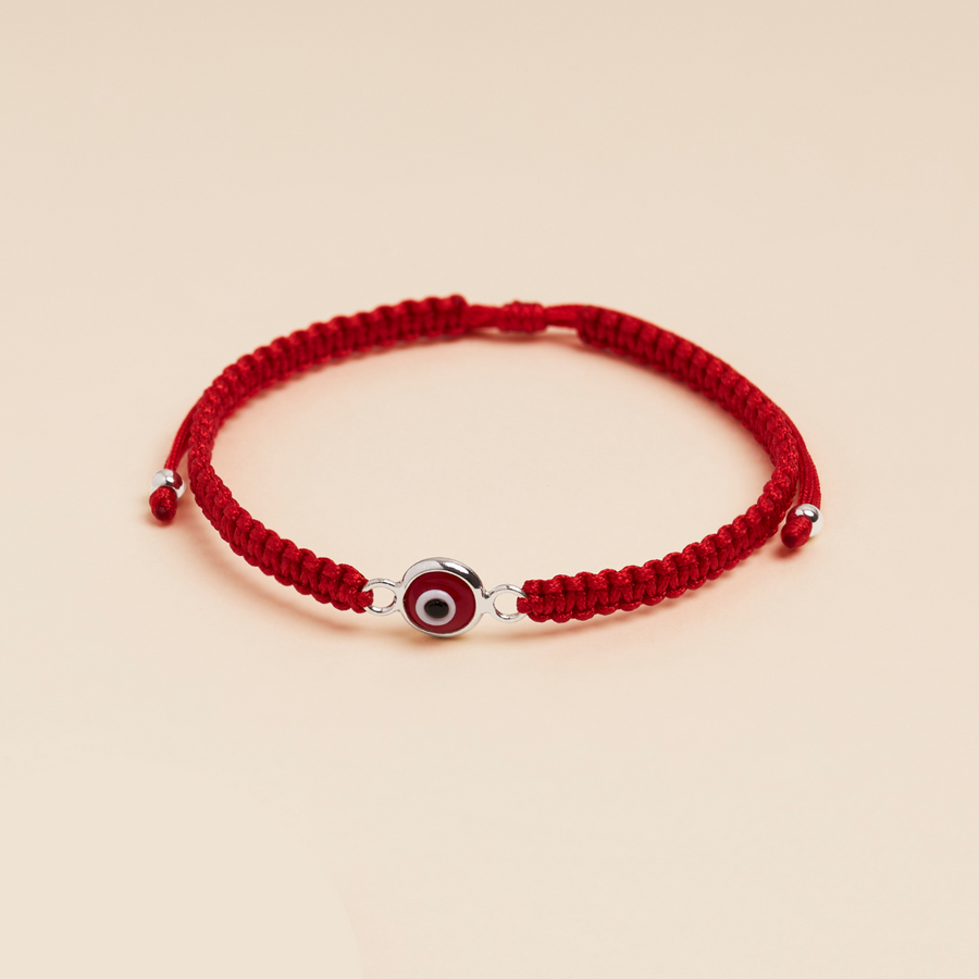 Pulsera Tejida con Punto Cruzado y Ojo Turco de Plata - Artesanía Exclusiva